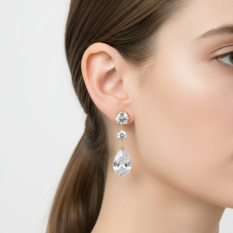 Earrings in 925 silver with pendant white zircons
