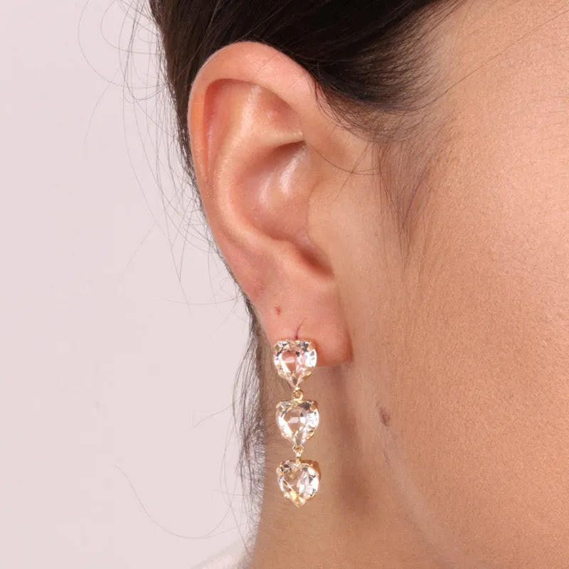 Earrings in 925 Silver with hanging hearts