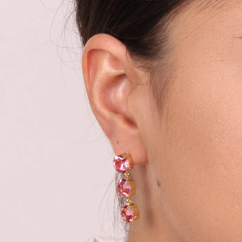 Earrings in 925 Silver with pink hanging light points
