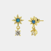 Orecchini in Argento 925 con rosa dei venti impreziosita da zircone blu e punto luce pendente