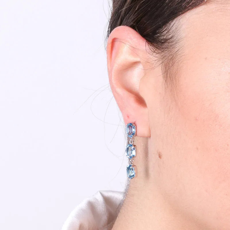 Earrings in 925 silver with blue pendant crystals