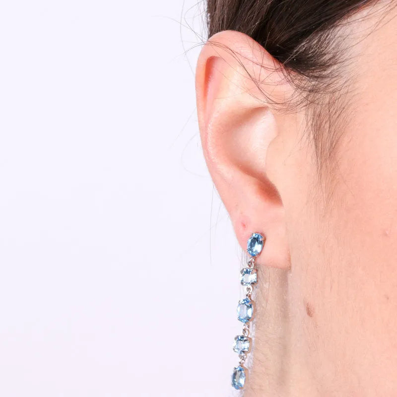 Earrings in 925 silver with blue pendant crystals
