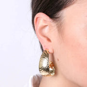 Orecchini in Argento 925 martellato a semicerchio