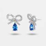 Orecchini argento 925 con zircone azzurro pendente e fiocco zirconato - BYSIMON gioielli