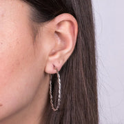 Orecchini in Argento 925 cerchio intrecciato placcati rodio