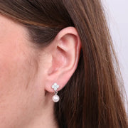 Orecchini in Argento 925 perla con fiore a lobo