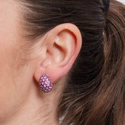 Orecchini in Argento 925 bombato con pave' rossi