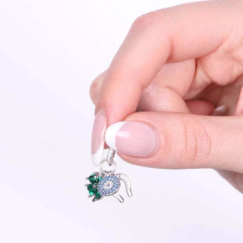 Ciondolo in Argento 925 con quadrifoglio, occhio portafortuna e ferro di cavallo