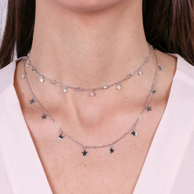 Collana in Argento 925 a doppia catena impreziosita da giro di stelline e zirconi bianchi pendenti