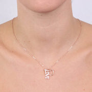 Collana in Argento 925 con cuore liscio pendente e scritta love arricchita da zirconi binchi e piccolo punto luce