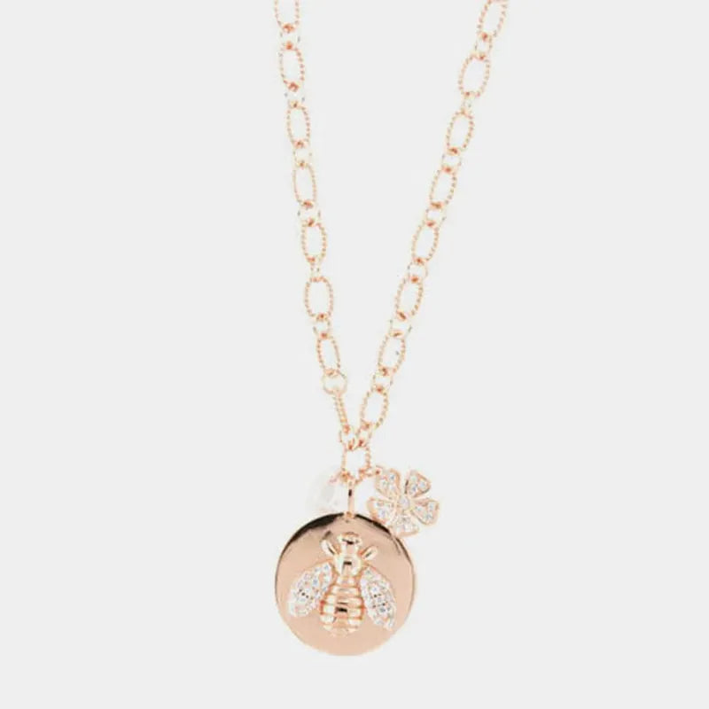 Collana in Argento 925 con ape su piastra, impreziosita da un fiore di zirconi bianchi e punti luce sulle ali