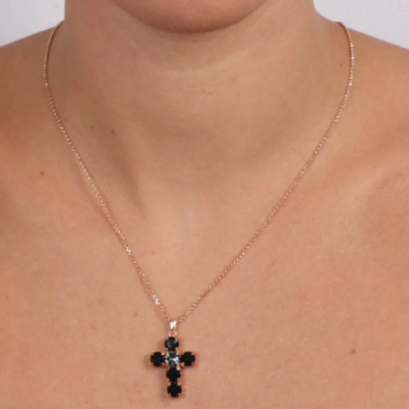 Sterling Silver 925 necklace with a cross pendant embellished with black crystals and a smoky crystal in the center.