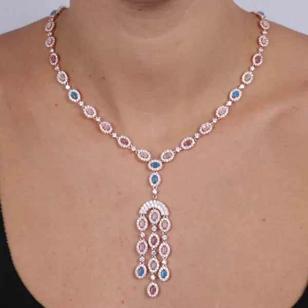 Collana in Argento 925 con girocollo di zirconi cabochon e fiocco multifilo pendente