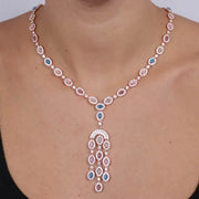 Collana in Argento 925 con girocollo di zirconi cabochon e fiocco multifilo pendente