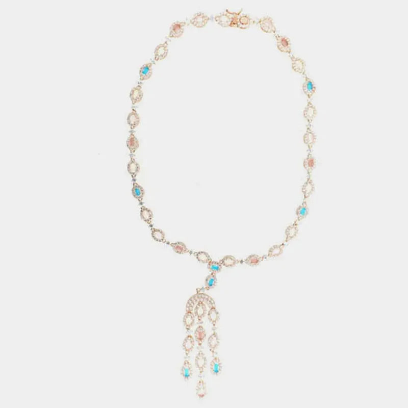 Collana in Argento 925 con girocollo di zirconi cabochon e fiocco multifilo pendente