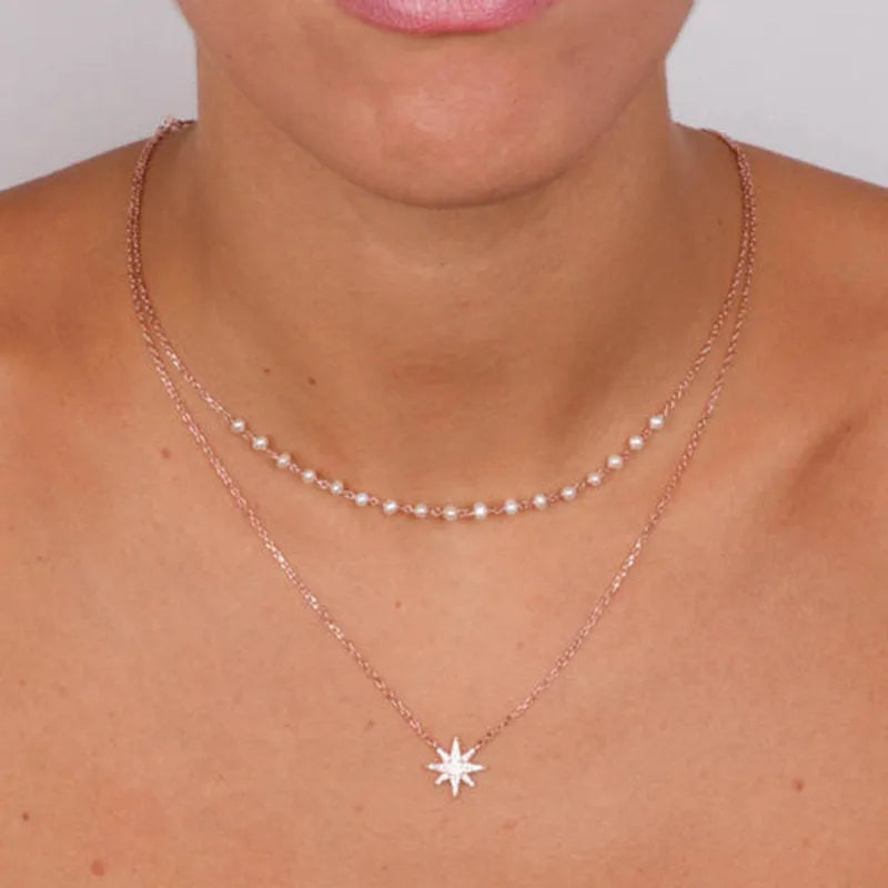 Collana in Argento 925 multifilo con pendente a forma di rosa dei venti e perle di acqua dolce