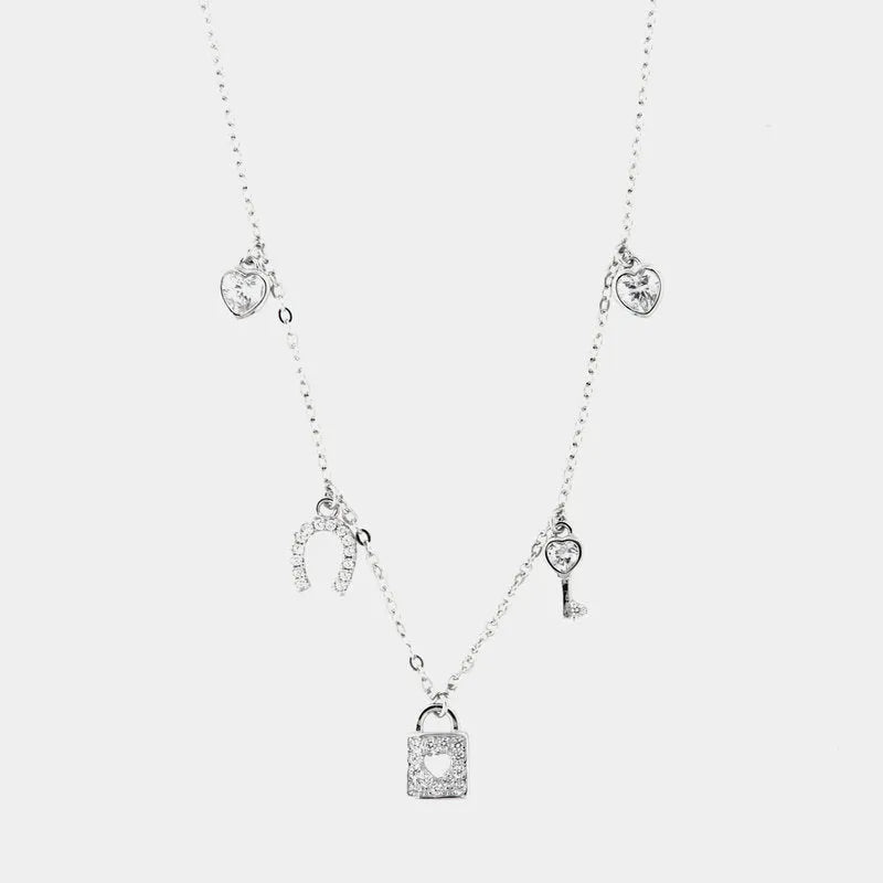 Collana in Argento 925 multiciondoli pendenti a forma chiave, cuore e ferro di cavallo arricchiti da zirconi bianchi