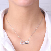 Collana in Argento 925 con simbolo infinito adornato da onda di zirconi bianchi e cuoricino
