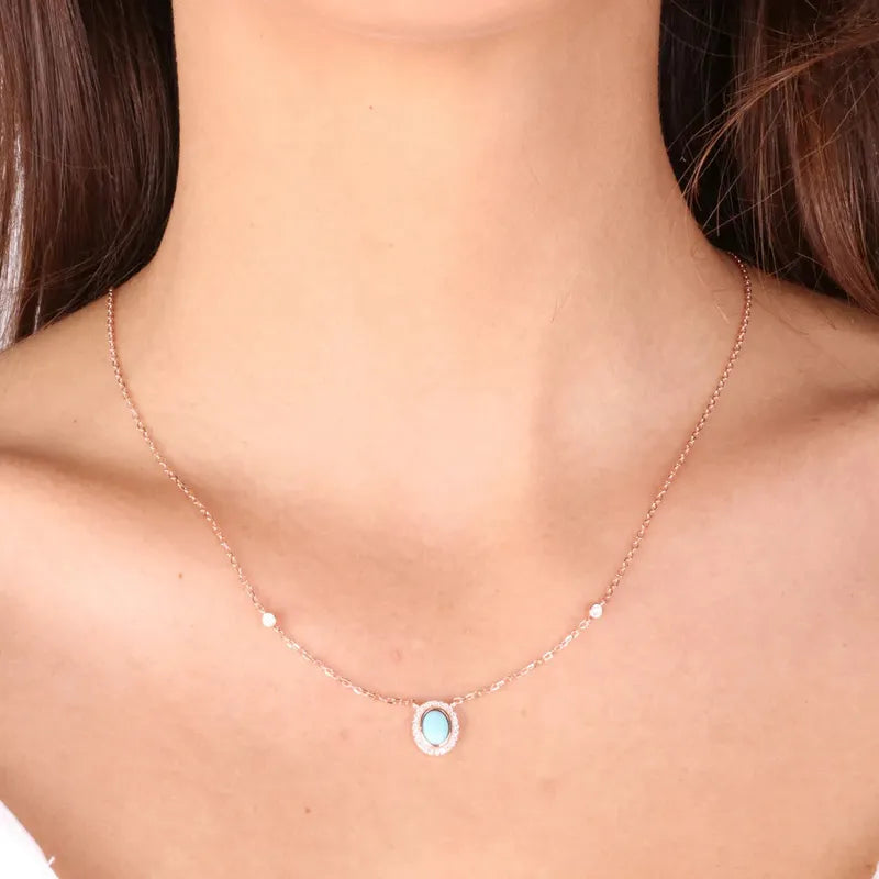 Collana in Argento 925 con ciondolo a forma di cerchio con  pietra centrale in pasta turchese e zirconi bianchi