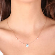 Collana in Argento 925 con ciondolo a forma di cerchio con  pietra centrale in pasta turchese e zirconi bianchi