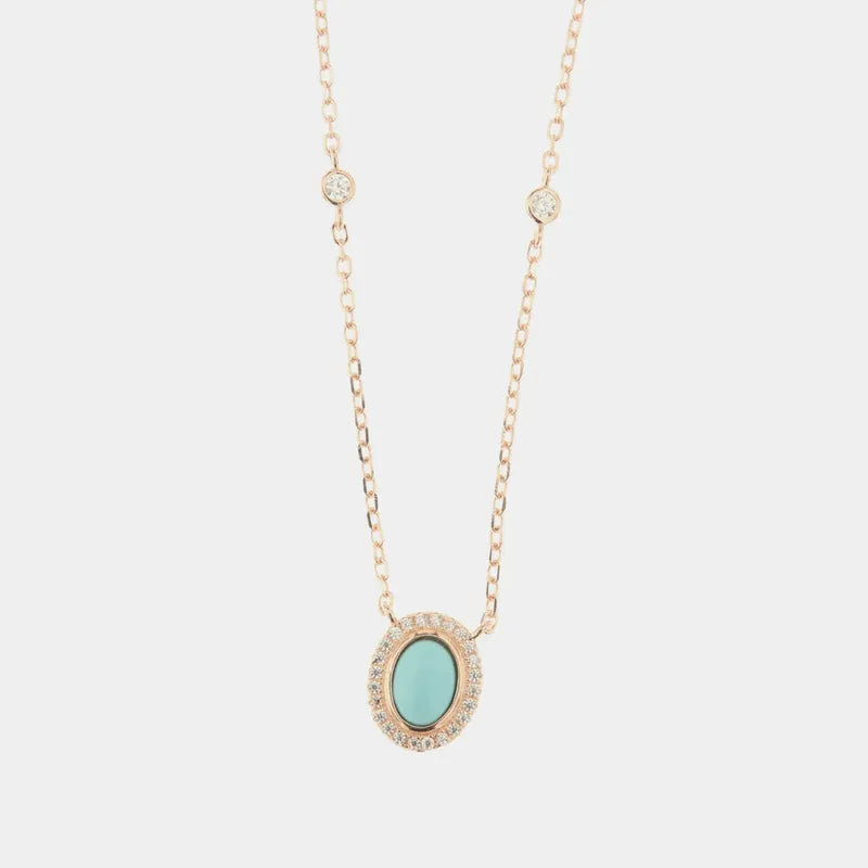 Collana in Argento 925 con ciondolo a forma di cerchio con  pietra centrale in pasta turchese e zirconi bianchi