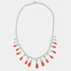 Collana in Argento 925 impreziosita da zirconi bianchi effetto floreale e pendenti a goccia effetto corallo rosso