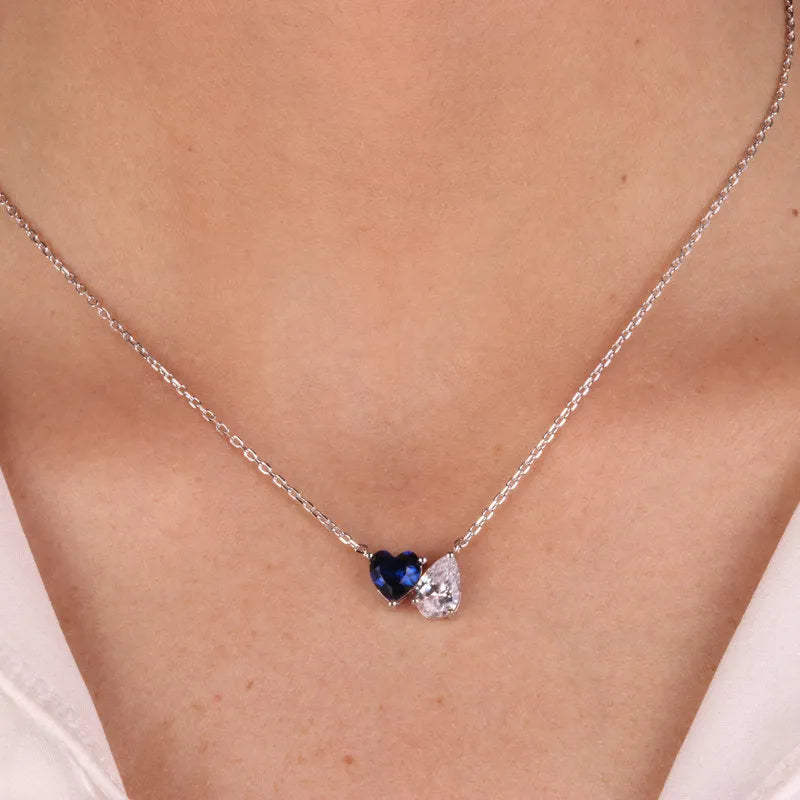 Necklace in 925 Silver with white zircons in the shape of a blue heart and a drop