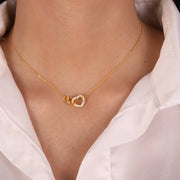 Collana in Argento 925 con cuore intrecciato ad anello