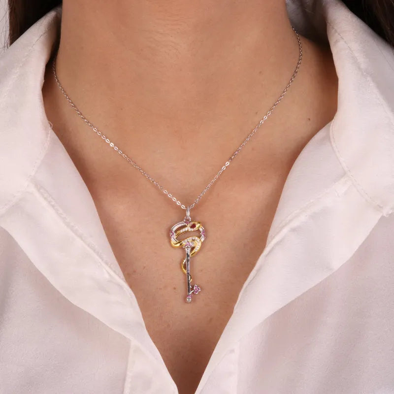 Collana in Argento 925 con serpente attorno ad una chiave Collezione Novecento - BYSIMON gioielli