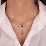 Collana in Argento 925 con serpente attorno ad una chiave