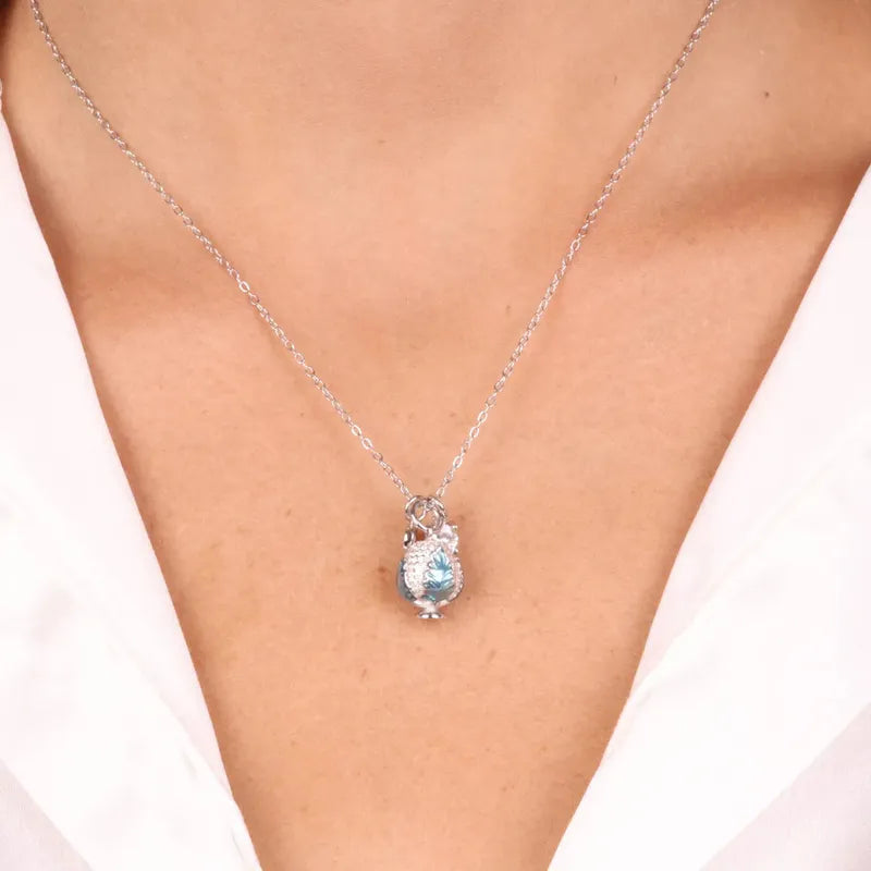 Collana in Argento 925 con pumo impreziosito da zirconi bianchi e cuore pendente
