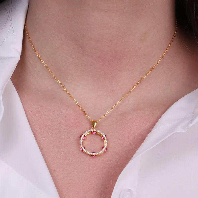 Collana in Argento 925 con tamburello impreziosito da zirconi rossi