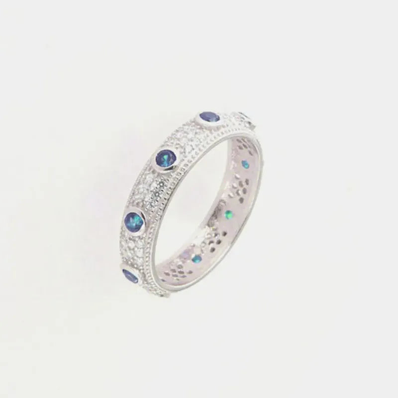 Anello in Argento 925 a fascia con zirconi banchi e zirconi blu