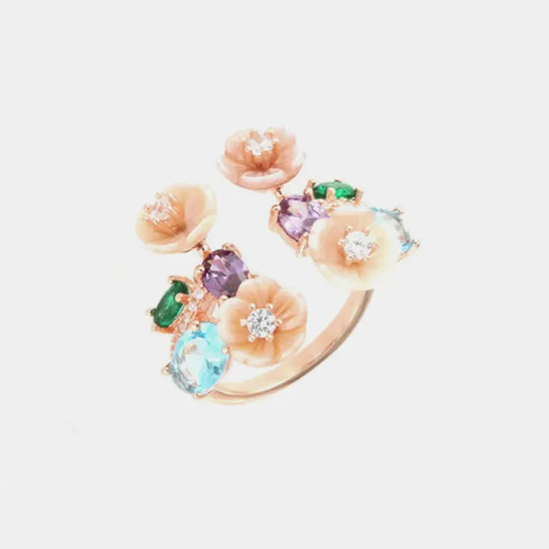 Anello in Argento 925  con fiori in madreperla impreziositi da punti luce bianchi, e zirconi colorati