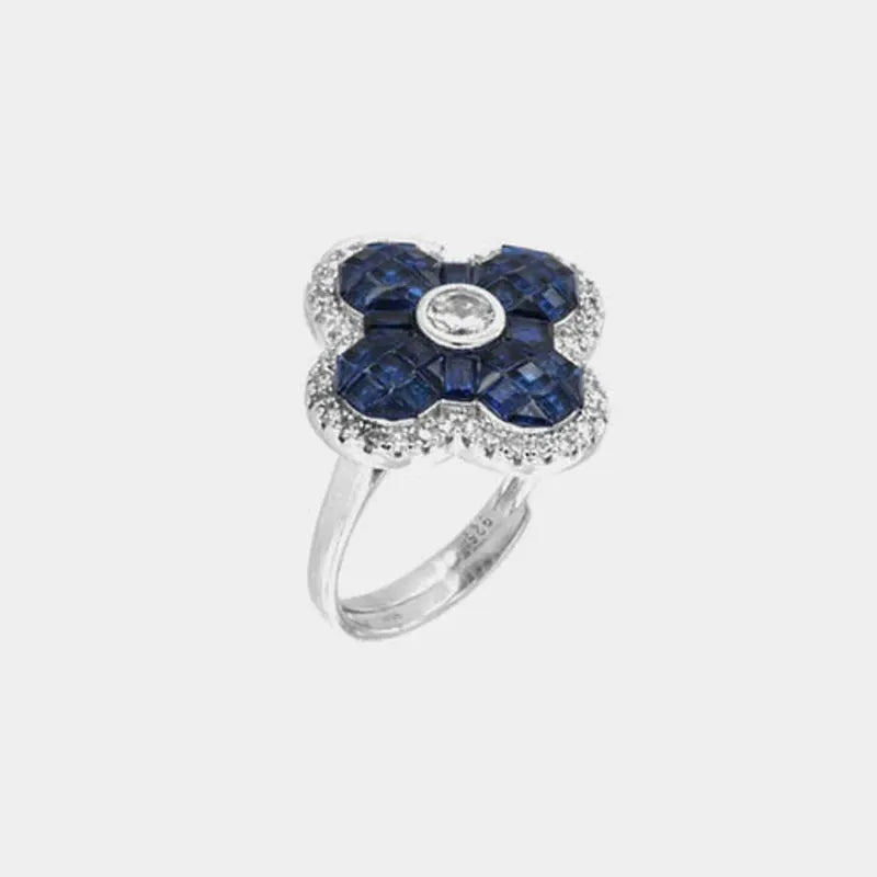 Anello in Argento 925  con fiore in zirconi color zaffiro impreziosito da zirconi bianchi