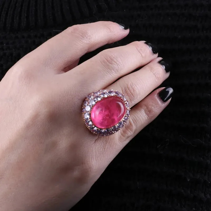 Anello in Argento 925 con grande zircone centrale rosa, impreziosito da zirconi nelle sfumature del viola