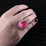 Anello in Argento 925 con grande zircone centrale rosa, impreziosito da zirconi nelle sfumature del viola