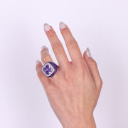 Anello in Argento 925 smaltato color viola impreziosito da zircone lilla centrale e zirconi bianchi