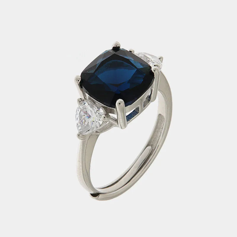 Anello in Argento 925 con zircone blu centrale e punti luce bianchi