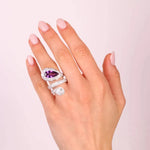 Anello in Argento 925 a contrarie con zircone viola e zirconi trasparenti