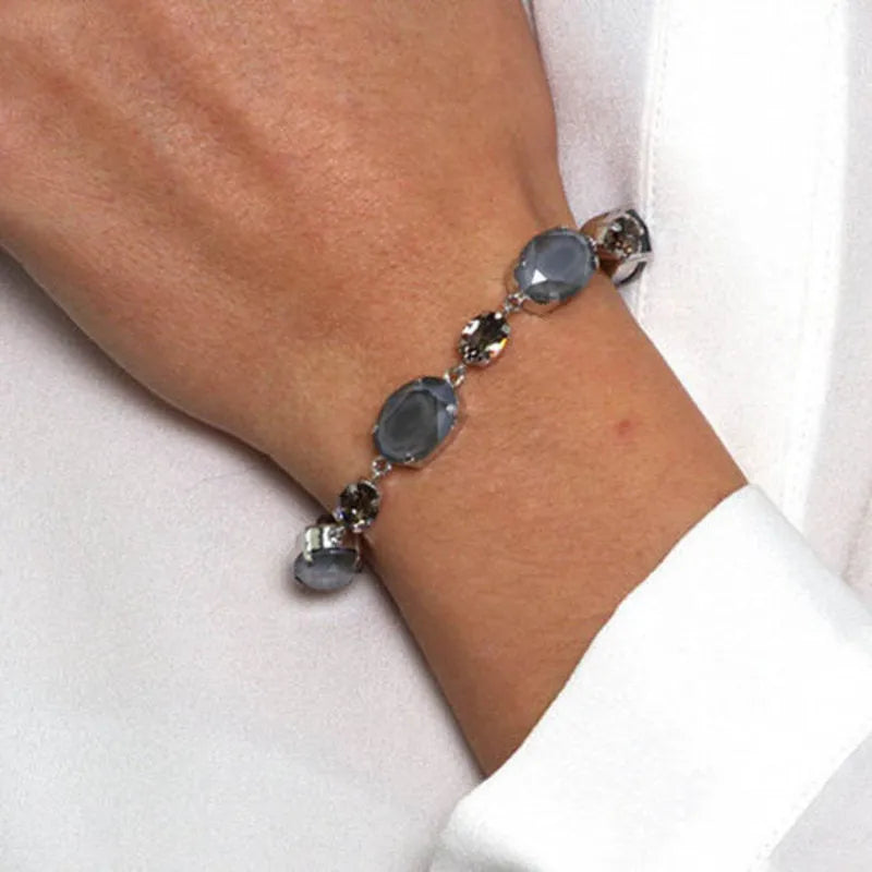 Bracciale in Argento 925 con giro di cristalli ovali bicolore ni colori del grigio