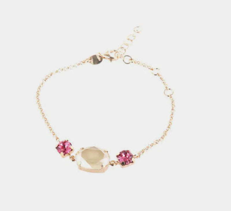Bracciale in Argento 925 con cristallo ovale centrale e doppio punto luce ai lati nelle sfumature del rosa
