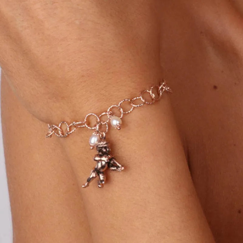 Bracciale in Argento 925  con puttino pendente e chiusura con perle