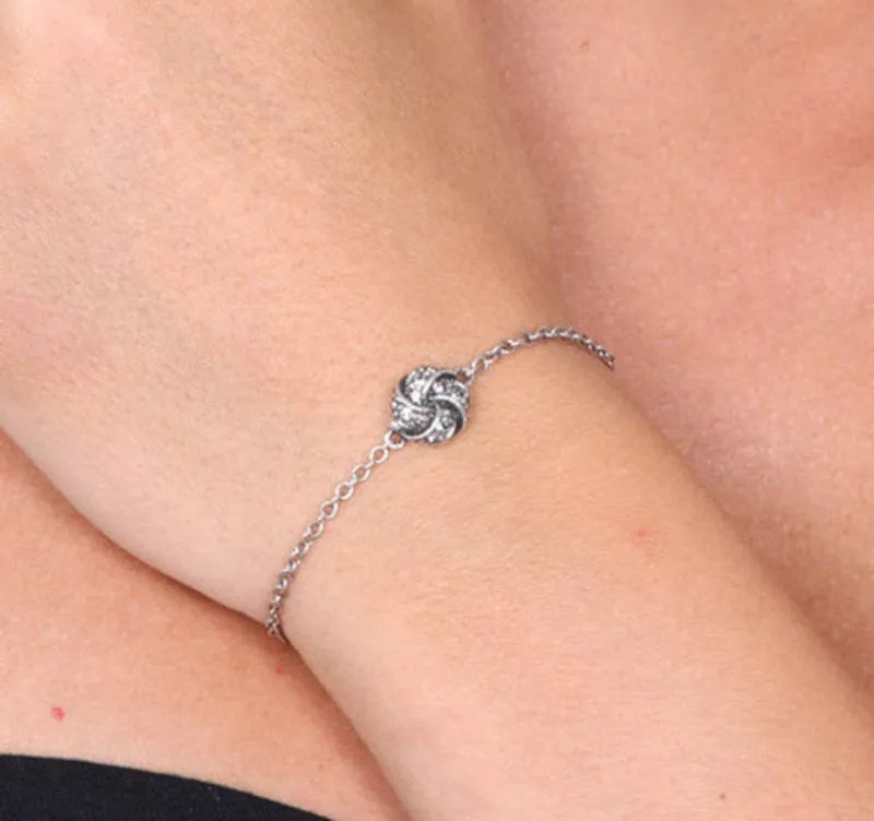 Bracciale in Argento 925 a forma di nodo stile antico con cristalli fume' e bianchi