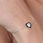 Bracciale in Argento 925 con cuore centrale impreziosito da zircone bianco e smalto nero