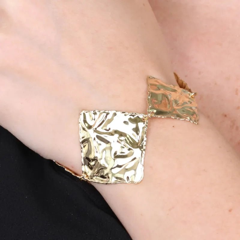 Bracciale in Argento 925 a rombi uniti martellati, effetto schiava