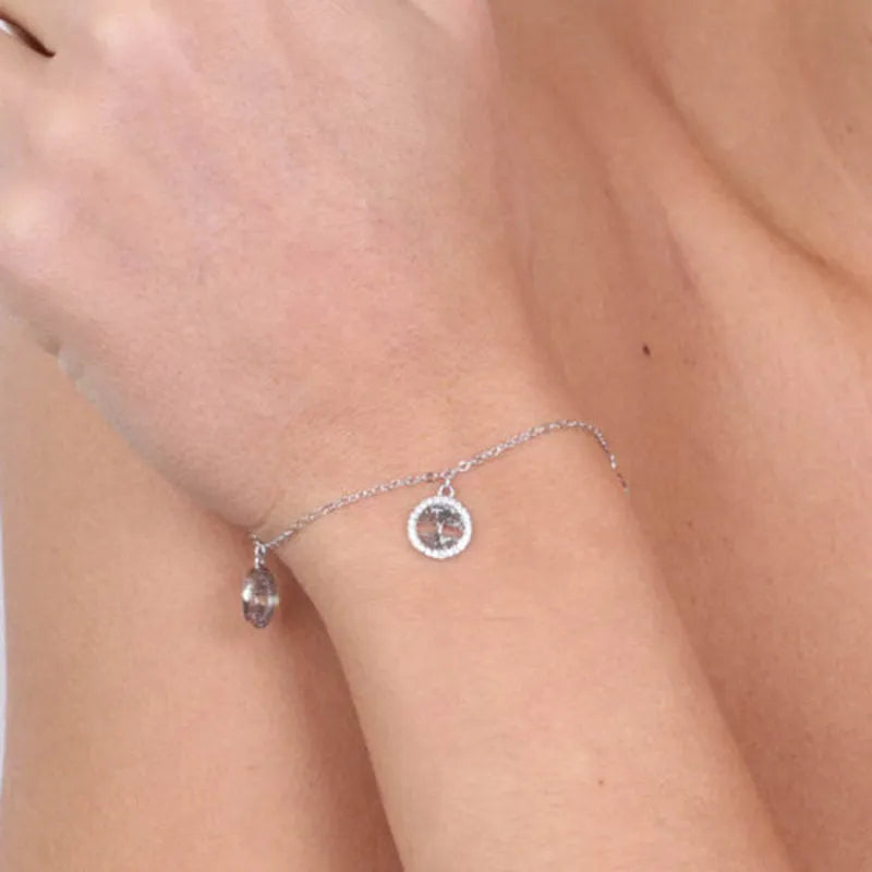 Bracciale in Argento 925 con alberi della vita pendenti arricchiti da zirconi bianchi Collezione Barcellona - BYSIMON gioielli