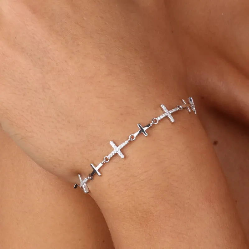 Bracciale in Argento 925 giro di croci zirconate bianche e croci lisce senza pietre