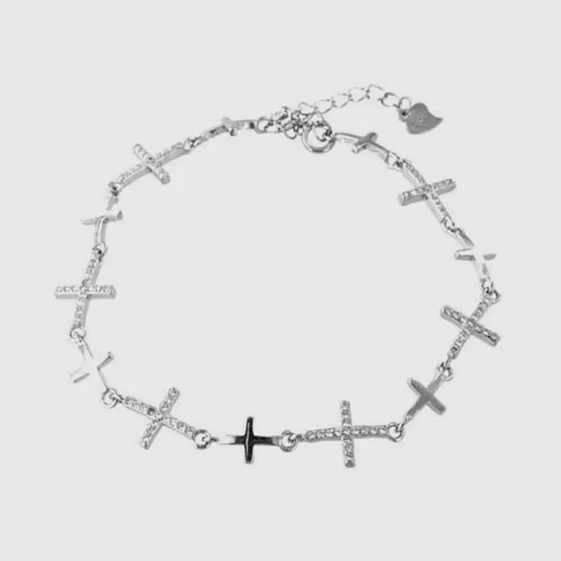 Bracciale in Argento 925 giro di croci zirconate bianche e croci lisce senza pietre
