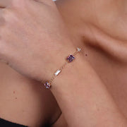 Bracciale in Argento 925 con giro di cristalli ametista e punti luce di cristalli bianchi.